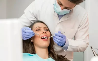 How often should I visit the dentist, and why are regular checkups important even if I don’t have pain?